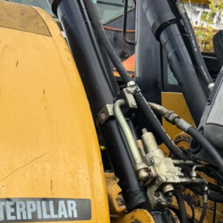 CATERPILLAR - M313D - Pelle à pneus