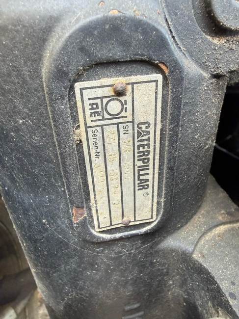 CATERPILLAR - M313D - Pelle à pneus