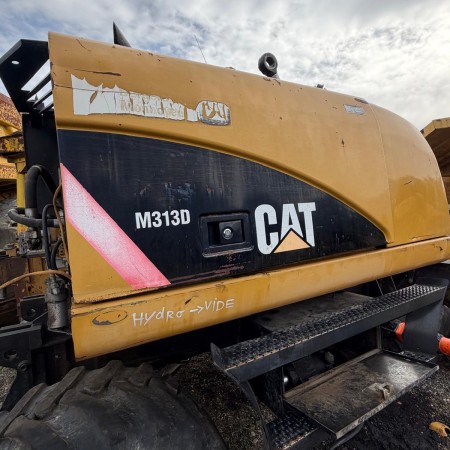 CATERPILLAR - M313D - Pelle à pneus