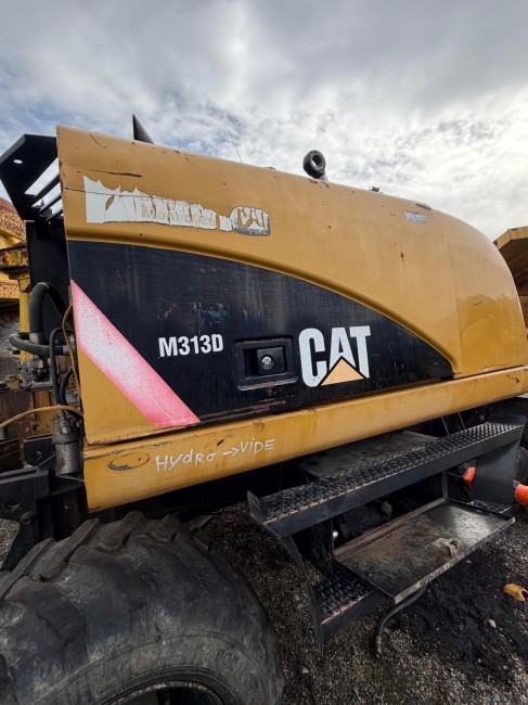 CATERPILLAR - M313D - Pelle à pneus